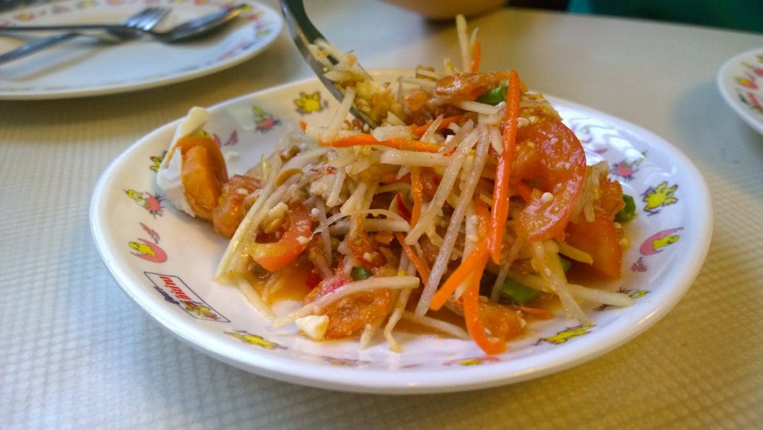 Thai street food | spicy papaya salad in Thailand