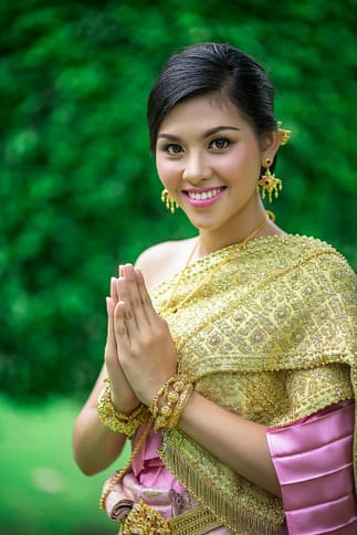 Woman in Thailand demonstrating a proper wai